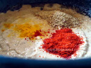adding spices for bhindi salan